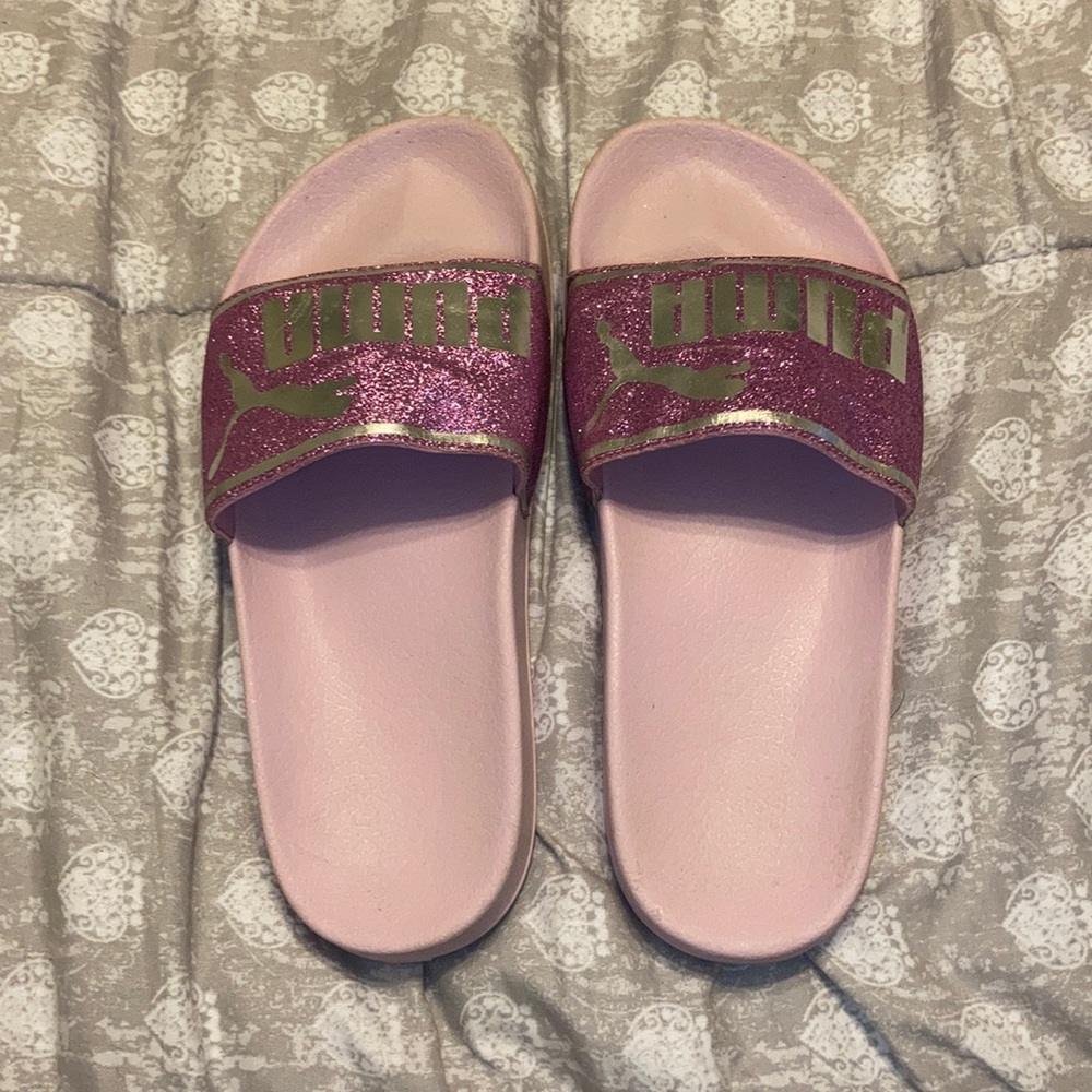 Puma slides.